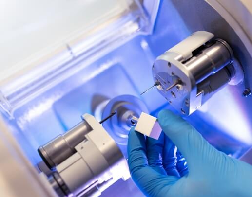 Dental team member using in office milling system